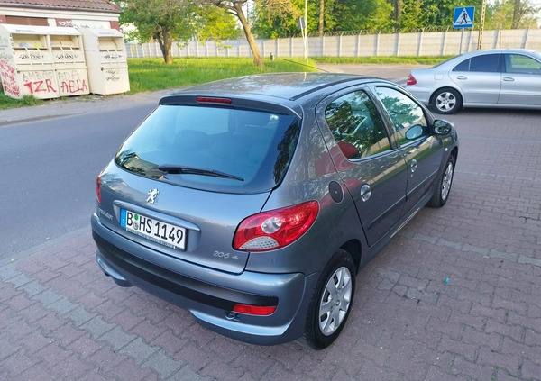 Peugeot 206 plus cena 11900 przebieg: 99875, rok produkcji 2009 z Szczecin małe 352